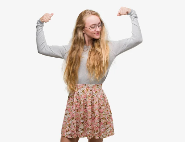 Blonde Teenager Woman Wearing Flowers Skirt Showing Arms Muscles Smiling — Stock Photo, Image