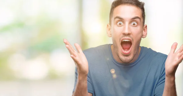Handsome Young Casual Man Celebrating Crazy Amazed Success Arms Raised — Stock Photo, Image