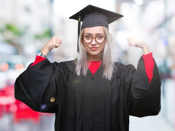 Young Blonde Woman Wearing Graduate Uniform Isolated Background Showing Arms — Stock Photo, Image