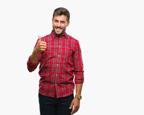 Jovem Homem Bonito Sobre Fundo Isolado Fazendo Polegares Felizes Gesto — Fotografia de Stock