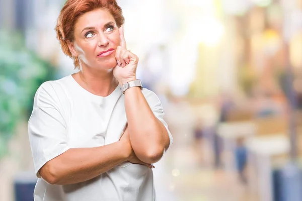 Atrractive Senior Caucasian Redhead Woman Isolated Background Hand Chin Thinking — стоковое фото