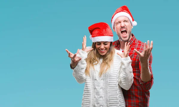 Young Couple Love Wearing Christmas Hat Isolated Background Celebrating Mad — Stock Photo, Image