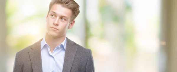 Young Handsome Blond Business Man Smiling Looking Side Staring Away — Stock Photo, Image