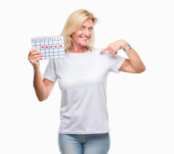 Medelålders Blond Kvinna Håller Menstruation Kalender Ver Isolerade Bakgrund Med — Stockfoto