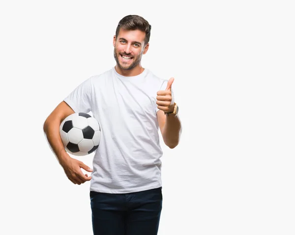 Młody Przystojny Mężczyzna Trzymając Piłka Nożna Piłka Nożna Białym Tle — Zdjęcie stockowe
