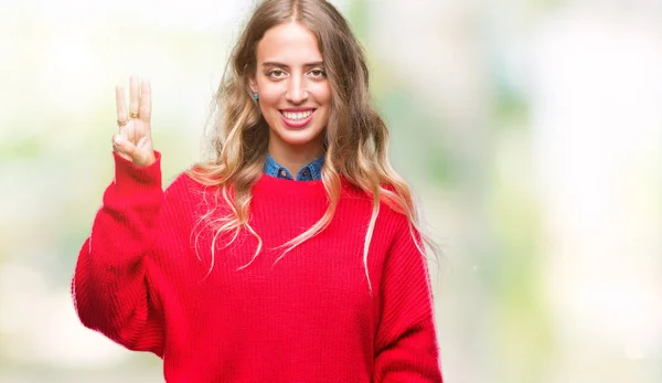 금발의 스웨터 배경에 보여주는 손가락으로 가리키는 자신감과 — 스톡 사진