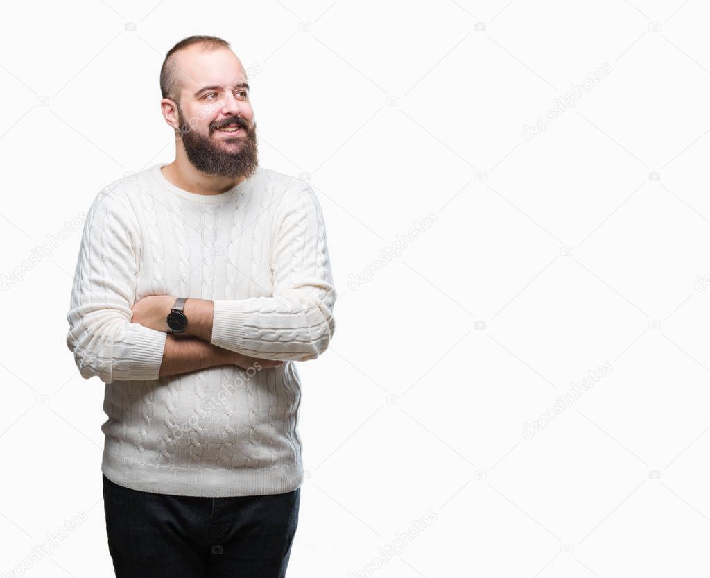 Young caucasian hipster man wearing winter sweater over isolated background smiling looking side and staring away thinking.