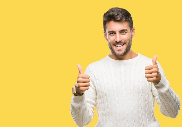 Joven Hombre Guapo Con Suéter Invierno Sobre Signo Éxito Fondo —  Fotos de Stock