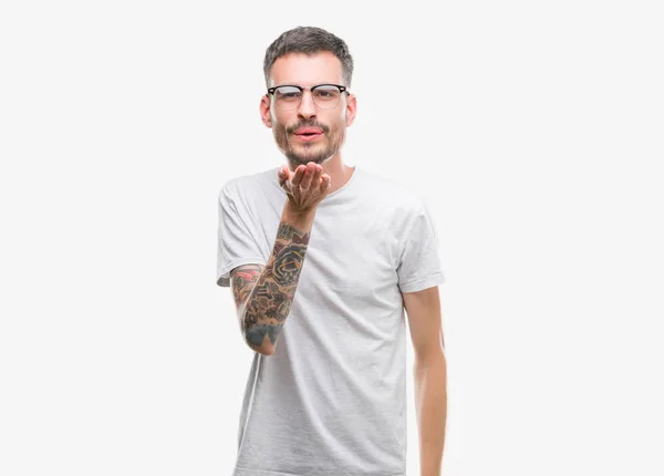 Young Tattooed Adult Man Looking Camera Blowing Kiss Hand Air — Stock Photo, Image