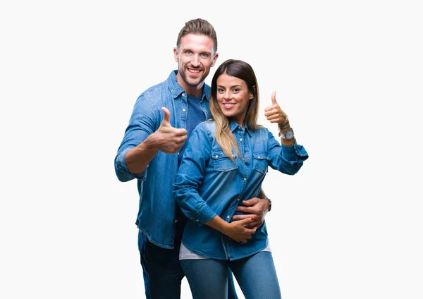 Pareja Joven Enamorada Sobre Fondo Aislado Haciendo Gesto Pulgares Felices —  Fotos de Stock