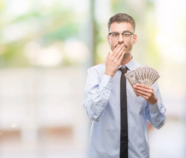 Jonge Hipster Zakenman Holding Dollar Cover Mond Met Hand Geschokt — Stockfoto