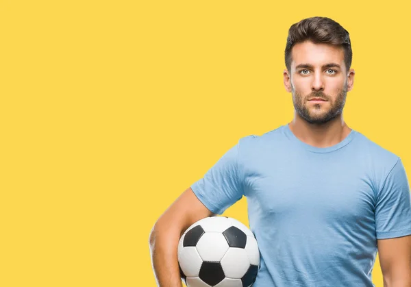 Jovem Homem Bonito Segurando Bola Futebol Sobre Fundo Isolado Com — Fotografia de Stock