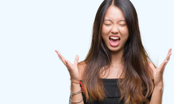 Young Asian Woman Isolated Background Celebrating Mad Crazy Success Arms — Stock Photo, Image