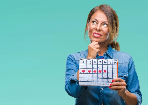 Medelåldern Senior Spansktalande Kvinna Som Håller Menstruation Kalender Isolerade Bakgrund — Stockfoto
