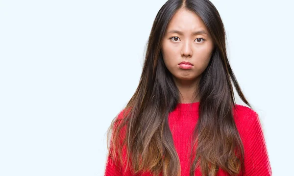 Junge Asiatische Frau Trägt Winterpullover Über Isoliertem Hintergrund Deprimiert Und — Stockfoto