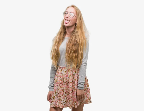 Blonde Teenager Woman Wearing Flowers Skirt Sticking Tongue Out Happy — Stock Photo, Image