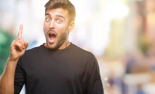 Joven Hombre Guapo Sobre Fondo Aislado Apuntando Con Dedo Hacia — Foto de Stock