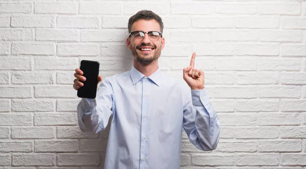 Hombre Adulto Joven Hablando Por Teléfono Pie Sobre Pared Ladrillo —  Fotos de Stock