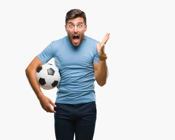 Молодой Красивый Мужчина Держит Футбольный Мяч Изолированном Фоне Счастливый Взволнованный — стоковое фото