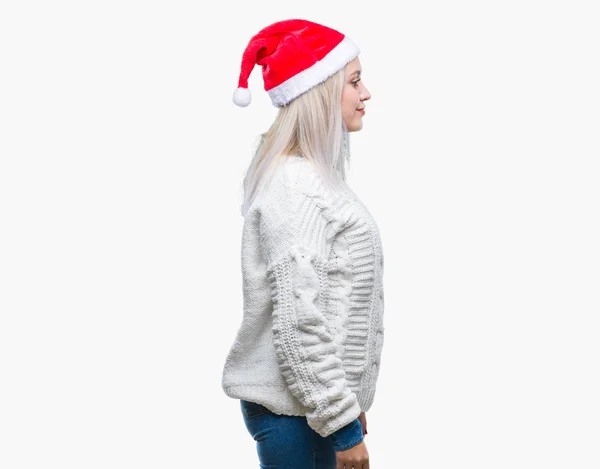 Jonge Blonde Vrouw Dragen Kerstmuts Geïsoleerde Achtergrond Zoek Naar Kant — Stockfoto