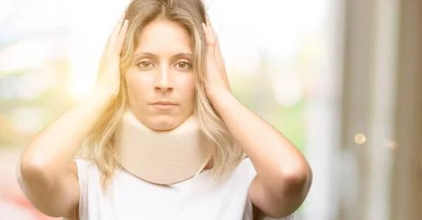 Young Injured Woman Wearing Neck Brace Covering Ears Ignoring Annoying — Stock Photo, Image