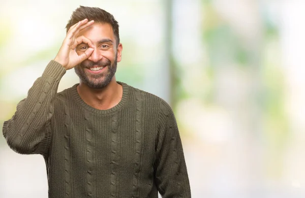 Erwachsener Hispanischer Mann Trägt Winterpullover Über Isoliertem Hintergrund Und Macht — Stockfoto