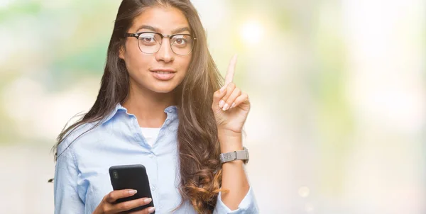 Young Beautiful Arab Woman Texting Using Smartphone Isolated Background Surprised — Stock Photo, Image