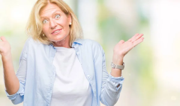 Middle Age Blonde Woman Isolated Background Clueless Confused Expression Arms — Stock Photo, Image