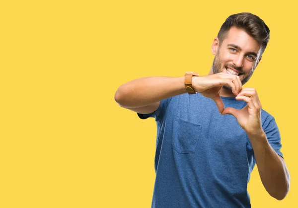 Jovem Homem Bonito Sobre Fundo Isolado Sorrindo Amor Mostrando Símbolo — Fotografia de Stock