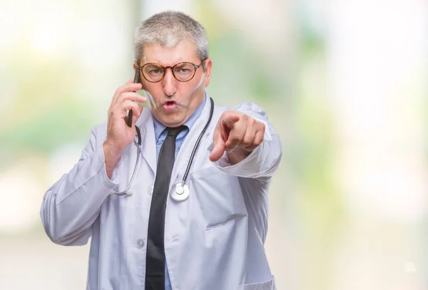 Handsome Senior Doctor Man Talking Smarpthone Isolated Background Pointing Finger — Stock Photo, Image