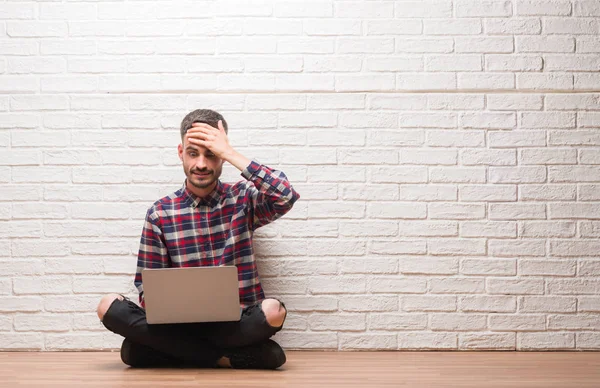 Hombre Joven Adulto Sobre Pared Ladrillo Usando Portátil Estresado Con —  Fotos de Stock