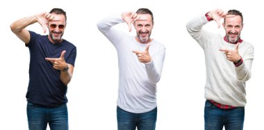 Yakışıklı üst düzey ağarmış adam elleriyle yapım çerçeve ve parmakları ile mutlu yüz gülümseyen izole arka plan üzerinde ayakta kolaj. Yaratıcılık ve Fotoğrafçılık kavramı.