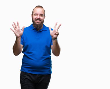 Genç beyaz hipster giyiyor mavi gömlek uzun kol üzerinde gösterilen arka plan izole ve parmakları ile işaret gülümseyen ise kendinden emin ve mutlu 8 numaralı.