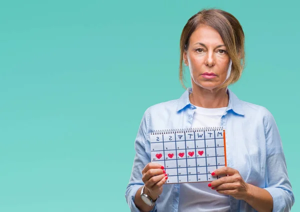 Mulher Hispânica Sênior Meia Idade Segurando Calendário Menstruação Sobre Fundo — Fotografia de Stock