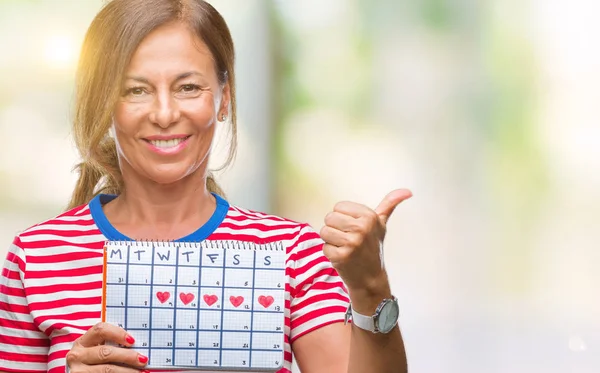 Mulher Hispânica Sênior Meia Idade Segurando Calendário Menstruação Sobre Fundo — Fotografia de Stock