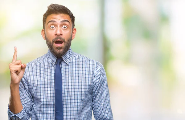 Erwachsener Hispanischer Geschäftsmann Mit Isoliertem Hintergrund Mit Erhobenem Zeigefinger Und — Stockfoto