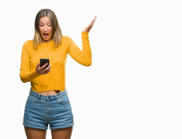 Young Beautiful Woman Sending Message Using Smartphone Isolated Background Very — Stock Photo, Image