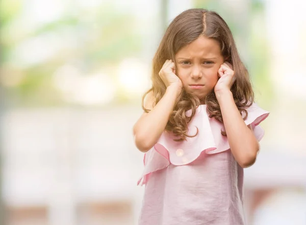 Brunette Hispanic Girl Wearing Pink Dress Covering Ears Fingers Annoyed — Stock Photo, Image