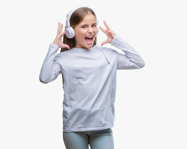 Young Beautiful Girl Wearing Headphones Listening Music Isolated Background Celebrating — Stock Photo, Image