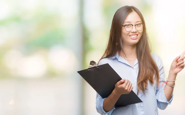 Young Asian Business Woman Holding Clipboard Isolated Background Very Happy — Stock Photo, Image
