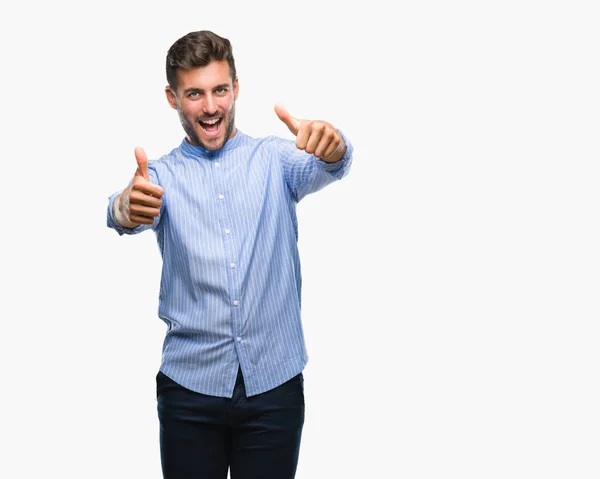 Joven Hombre Guapo Sobre Fondo Aislado Aprobando Hacer Gesto Positivo —  Fotos de Stock