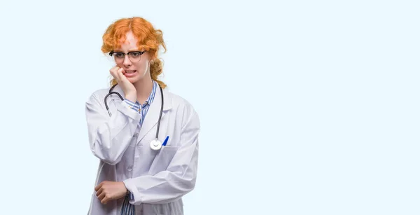 Young Redhead Woman Wearing Doctor Uniform Looking Stressed Nervous Hands — Stock Photo, Image