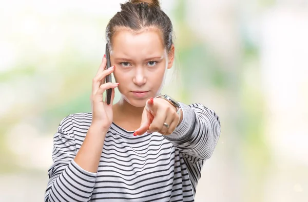 Young Beautiful Caucasian Woman Talking Smartphone Isolated Background Pointing Finger — Stock Photo, Image