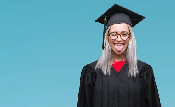 Young Blonde Woman Wearing Graduate Uniform Isolated Background Sticking Tongue — Stock Photo, Image