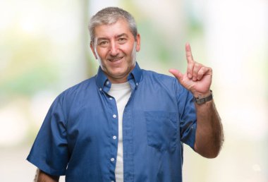 Başarılı fikirle parmağı yukarıyı izole arka plan üzerinde yakışıklı komuta sizde. Çıktıktan ve mutlu. Bir numara.