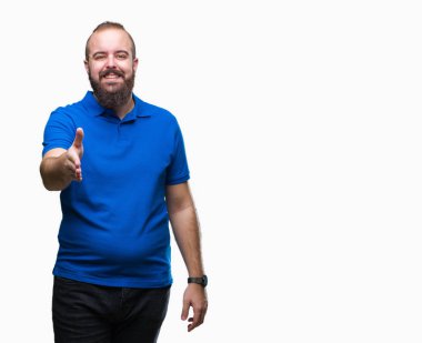 Üzerinde mavi gömlek giymiş genç beyaz hipster adam arka plan dostu sunan karşılıklı tebrik ve davet edici gülümseyen izole. Başarılı iş.