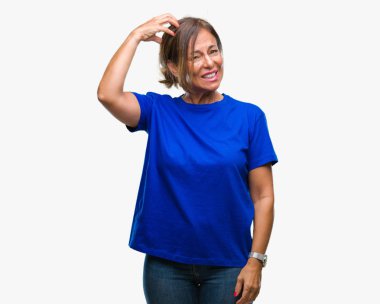 Orta yaş izole arka plan üzerine İspanyol kadın kıdemli yanıltır ve soru hakkında merak ediyorum. Şüphe, kafasına el ile düşünme ile belirsiz. Dalgın kavramı.