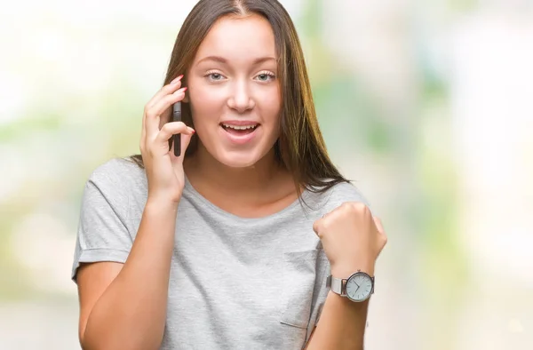 Young Beautiful Caucasian Woman Talking Smartphone Isolated Background Screaming Proud — Stock Photo, Image