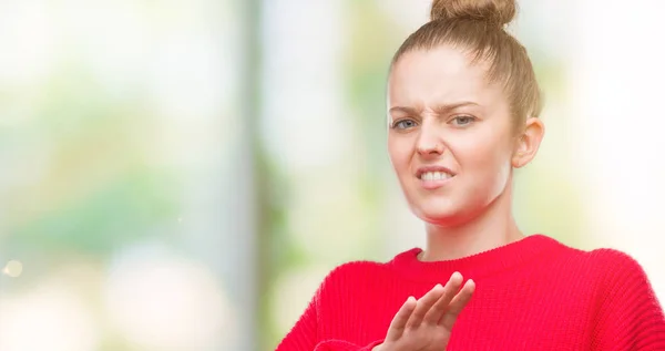 Young Blonde Woman Wearing Bun Red Sweater Disgusted Expression Displeased — Stock Photo, Image
