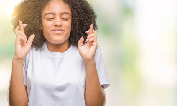 Young Afro American Woman Isolated Background Smiling Crossing Fingers Hope — Stock Photo, Image